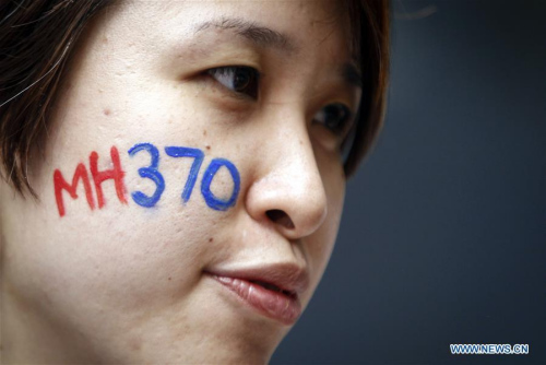 A woman attends a commemoration event for the ill-fated Flight MH370 in Malaysian capital Kuala Lumpur March 6, 2016. Flight MH370, a Boeing 777-200ER, disappeared on March 8, 2014, from Kuala Lumpur en route to Beijing with a total of 239 people on board, most of them Chinese nationals. (Photo/Xinhua) A woman attends a commemoration event for the ill-fated Flight MH370 in Malaysian capital Kuala Lumpur March 6, 2016. Flight MH370, a Boeing 777-200ER, disappeared on March 8, 2014, from Kuala Lumpur en route to Beijing with a total of 239 people on board, most of them Chinese nationals. (Photo/Xinhua)