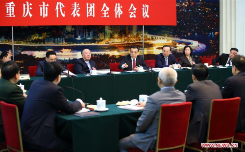 Chinese Premier Li Keqiang joins a group deliberation of deputies from Chongqing to the annual session of the National People's Congress in Beijing, capital of China, March 8, 2016. (Photo: Xinhua/Ding Haitao) Chinese Premier Li Keqiang joins a group deliberation of deputies from Chongqing to the annual session of the National People's Congress in Beijing, capital of China, March 8, 2016. (Photo: Xinhua/Ding Haitao)