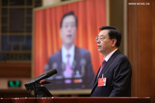 Zhang Dejiang, chairman of the Standing Committee of China's National People's Congress (NPC), delivers a report on the work of the NPC Standing Committee during the second plenary meeting of the fourth session of the 12th NPC at the Great Hall of the People in Beijing, capital of China, March 9, 2016. (Xinhua/Ju Peng) Zhang Dejiang, chairman of the Standing Committee of China's National People's Congress (NPC), delivers a report on the work of the NPC Standing Committee during the second plenary meeting of the fourth session of the 12th NPC at the Great Hall of the People in Beijing, capital of China, March 9, 2016. (Xinhua/Ju Peng)