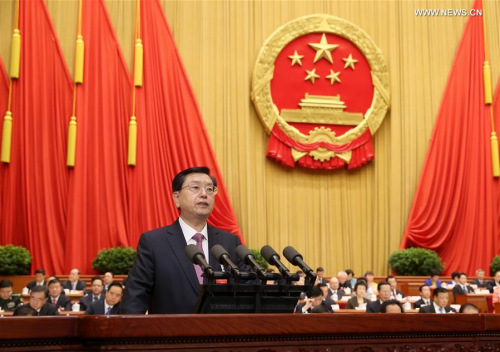 Zhang Dejiang, chairman of the Standing Committee of China's National People's Congress (NPC), delivers a report on the work of the NPC Standing Committee during the second plenary meeting of the fourth session of the 12th NPC at the Great Hall of the People in Beijing, capital of China, March 9, 2016. (Photo: Xinhua/Yao Dawei)