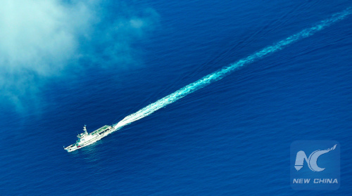An aerial photo taken on Sept. 25, 2015 from a seaplane of Hainan Maritime Safety Administration shows cruise vessel Haixun 1103 heading to the Yacheng 13-1 drilling rig during a patrol in south China Sea. (Xinhua/Zhao Yingquan) An aerial photo taken on Sept. 25, 2015 from a seaplane of Hainan Maritime Safety Administration shows cruise vessel Haixun 1103 heading to the Yacheng 13-1 drilling rig during a patrol in south China Sea. (Xinhua/Zhao Yingquan)