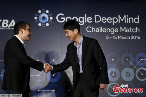 South Korean professional Go player Lee Sedol, right, shakes hands with CEO of Google DeepMind Demis Hassabis, left, during a press conference ahead of the Google DeepMind Challenge Match in Seoul, South Korea, March 8, 2016. (Photo provided to China News Service) South Korean professional Go player Lee Sedol, right, shakes hands with CEO of Google DeepMind Demis Hassabis, left, during a press conference ahead of the Google DeepMind Challenge Match in Seoul, South Korea, March 8, 2016. (Photo provided to China News Service)