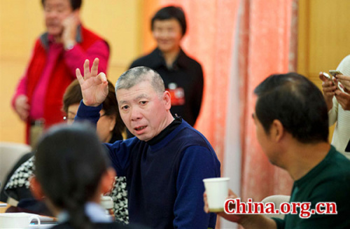 Feng Xiaogang, a director and member of the 12th National Committee of the Chinese People's Political Consultative Conference (CPPCC), speaks at a meeting during the ongoing annual session of the top political advisory body on March 7, 2016 in Beijing. (Photo: China.org.cn/Wu Wenda) Feng Xiaogang, a director and member of the 12th National Committee of the Chinese People's Political Consultative Conference (CPPCC), speaks at a meeting during the ongoing annual session of the top political advisory body on March 7, 2016 in Beijing. (Photo: China.org.cn/Wu Wenda)