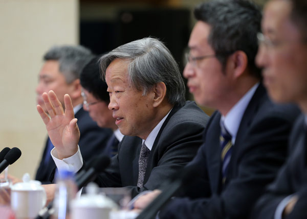 Liu Hainian, head of the human rights research center of the Chinese Academy of Social Sciences, addresses a news conference on Monday on U.S. human rights.(Photo by Wang Zhuangfei/China Daily)