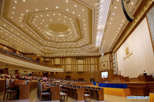 Representatives attend a session at the Union Parliament in Nay Pyi Taw, Myanmar, March 15, 2016. U Htin Kyaw of Myanmar's ruling National League for Democracy (NLD), led by Aung San Suu Kyi, won the presidential election Tuesday with the highest number of votes through secret voting, becoming the country's new president for the next five-year term. (Xinhua/U Aung) Representatives attend a session at the Union Parliament in Nay Pyi Taw, Myanmar, March 15, 2016. U Htin Kyaw of Myanmar's ruling National League for Democracy (NLD), led by Aung San Suu Kyi, won the presidential election Tuesday with the highest number of votes through secret voting, becoming the country's new president for the next five-year term. (Xinhua/U Aung)