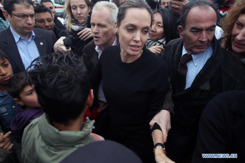 U.S. actress and special envoy of the United Nations High Commissioner for Refugees (UNHCR), Angelina Jolie (C), visits the temporary refugee facilities at the port of Piraeus, near Athens, Greece, March 16, 2016. (Xinhua/Marios Lolos) U.S. actress and special envoy of the United Nations High Commissioner for Refugees (UNHCR), Angelina Jolie (C), visits the temporary refugee facilities at the port of Piraeus, near Athens, Greece, March 16, 2016. (Xinhua/Marios Lolos)