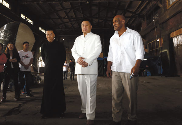 Chinese kungfu star Donnie Yen (left), Ip Man 3's main investor Shi Jianxiang (middle) and Mike Tyson meet the press on May 16 at a film studio in Shanghai, where part of the upcoming film about Bruce Lee's teacher is being shot. (Provided to China Daily) Chinese kungfu star Donnie Yen (left), Ip Man 3's main investor Shi Jianxiang (middle) and Mike Tyson meet the press on May 16 at a film studio in Shanghai, where part of the upcoming film about Bruce Lee's teacher is being shot. (Provided to China Daily)