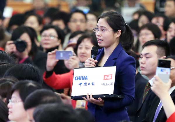 China Daily reporter Wu Jiao asks Premier Li a question at the news conference on Wednesday. Wang Zhuangfei / China Daily China Daily reporter Wu Jiao asks Premier Li a question at the news conference on Wednesday. Wang Zhuangfei / China Daily