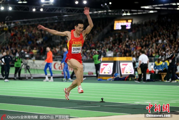 Dong Bin of China jumps at IAAF World Indoor Championships in Portland, March 20, 2016. (Photo/Osports) Dong Bin of China jumps at IAAF World Indoor Championships in Portland, March 20, 2016. (Photo/Osports)