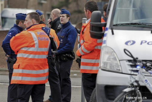 Policemen stand guard outside the Brussels airport in Brussels, Belgium, on March 22, 2016. The death toll has risen to 34 in the deadly blasts in Brussels on Tuesday morning, according to the latest figures. (Xinhua/Zhou Lei) Policemen stand guard outside the Brussels airport in Brussels, Belgium, on March 22, 2016. The death toll has risen to 34 in the deadly blasts in Brussels on Tuesday morning, according to the latest figures. (Xinhua/Zhou Lei)