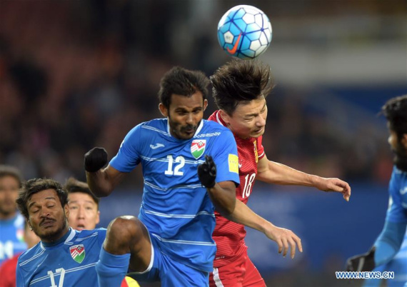 Gao Lin (R) of China vies with Adey Ashadh (C) of Maldives during the 2018 FIFA World Cup qualification football match in Wuhan, central China's Hubei Province, March 24, 2016. (Photo: Xinhua/Cheng Min) Gao Lin (R) of China vies with Adey Ashadh (C) of Maldives during the 2018 FIFA World Cup qualification football match in Wuhan, central China's Hubei Province, March 24, 2016. (Photo: Xinhua/Cheng Min)