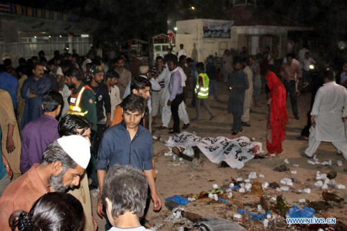 Pakistani people gather at the blast site in eastern Pakistan's Lahore, March 27, 2016. At least 63 people including women and kids were killed and over 306 others injured when a suicide bomber hit a public park in Lahore on Sunday evening, officials said. (Xinhua/Jamil Ahmed) Pakistani people gather at the blast site in eastern Pakistan's Lahore, March 27, 2016. At least 63 people including women and kids were killed and over 306 others injured when a suicide bomber hit a public park in Lahore on Sunday evening, officials said. (Xinhua/Jamil Ahmed)