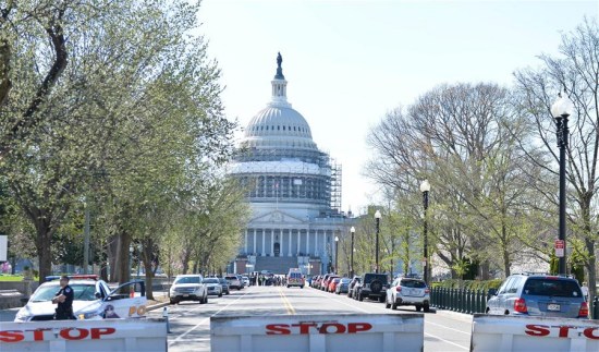 Police block the area near the U.S. Capitol Building after a shooting incident in Washington D.C., the United States, March 28, 2016. The U.S. Capitol Hill and the White House were both on lockdown Monday afternoon after a shooting incident at the Visitors Center of the Capitol complex left a police injured. (Xinhua/Bao Dandan) Police block the area near the U.S. Capitol Building after a shooting incident in Washington D.C., the United States, March 28, 2016. The U.S. Capitol Hill and the White House were both on lockdown Monday afternoon after a shooting incident at the Visitors Center of the Capitol complex left a police injured. (Xinhua/Bao Dandan)