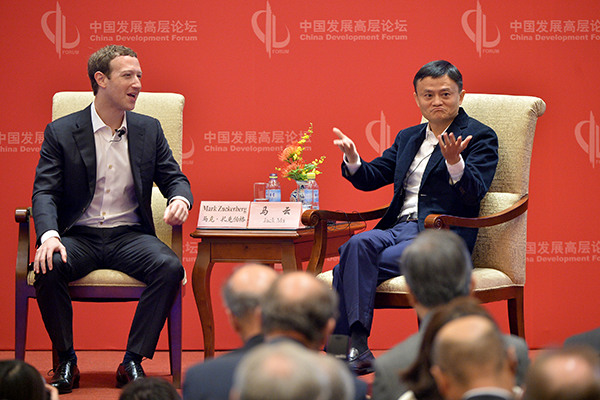 Mark Zuckerberg, CEO of Facebook Inc, talks with Jack Ma, chairman of Alibaba Group Holding Ltd at the China Development Forum in Beijing on Saturday. (Photo/Xinhua) Mark Zuckerberg, CEO of Facebook Inc, talks with Jack Ma, chairman of Alibaba Group Holding Ltd at the China Development Forum in Beijing on Saturday. (Photo/Xinhua)