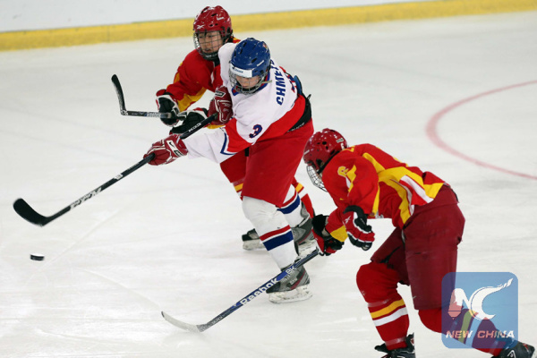 Zhang Mengying (L) and Liu Zhixin (R) of China vie with Klara Chmelova of the Czech Republic during a final stage match of the women's ice hockey qualification tournament of 2014 Winter Olympics, in Weiden, Germany, on Feb. 10, 2013. (Xinhua/Luo Huanhuan) Zhang Mengying (L) and Liu Zhixin (R) of China vie with Klara Chmelova of the Czech Republic during a final stage match of the women's ice hockey qualification tournament of 2014 Winter Olympics, in Weiden, Germany, on Feb. 10, 2013. (Xinhua/Luo Huanhuan)