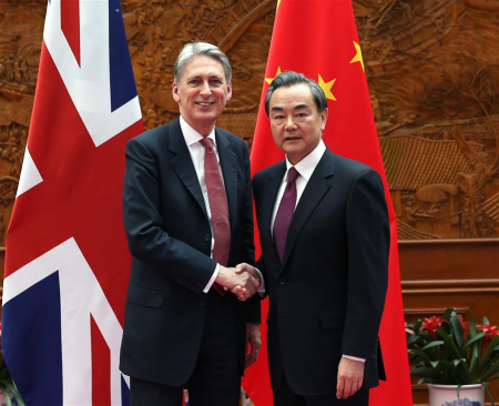Chinese Foreign Minister Wang Yi (R) meets with visiting British Foreign Secretary Philip Hammond in Beijing, capital of China, April 9, 2016. (Xinhua/Pang Xinglei) Chinese Foreign Minister Wang Yi (R) meets with visiting British Foreign Secretary Philip Hammond in Beijing, capital of China, April 9, 2016. (Xinhua/Pang Xinglei)