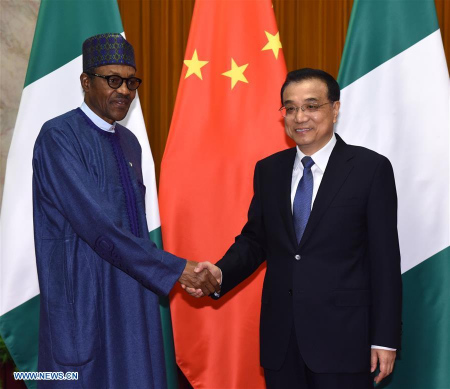 Chinese Premier Li Keqiang (R) meets with Nigerian President Muhammadu Buhari at the Great Hall of the People in Beijing, capital of China, April 13, 2016. (Xinhua/Rao Aimin) Chinese Premier Li Keqiang (R) meets with Nigerian President Muhammadu Buhari at the Great Hall of the People in Beijing, capital of China, April 13, 2016. (Xinhua/Rao Aimin)