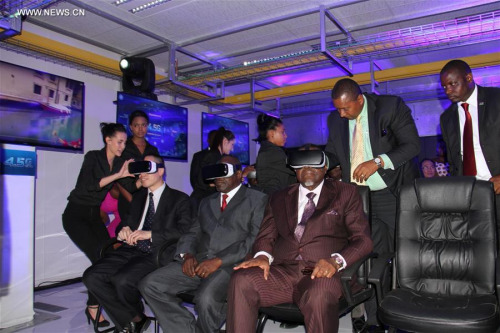Namibian President Hage Geingob (R, front) and guests test VR devices using 4.5G in capital Windhoek, Namibia on April 14, 2016. The Chinese company Huawei Technologies in conjunction with Namibia's MTC launched Thursday the 4.5 G demo for the first time ever in Africa.(Photo:Xinhua/Wu Changwei) Namibian President Hage Geingob (R, front) and guests test VR devices using 4.5G in capital Windhoek, Namibia on April 14, 2016. The Chinese company Huawei Technologies in conjunction with Namibia's MTC launched Thursday the 4.5 G demo for the first time ever in Africa.(Photo:Xinhua/Wu Changwei)