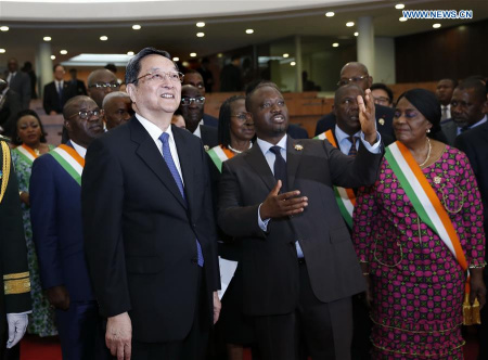 Yu Zhengsheng (L front), chairman of the National Committee of the Chinese People's Political Consultative Conference, visits the plenary hall of Cote d'Ivoire's parliament after talks with Cote d'Ivoire's Parliament Speaker Guillaume Soro in Abidjan, Cote d'Ivoire, April 14, 2016. (Photo: Xinhua/Ju Peng) Yu Zhengsheng (L front), chairman of the National Committee of the Chinese People's Political Consultative Conference, visits the plenary hall of Cote d'Ivoire's parliament after talks with Cote d'Ivoire's Parliament Speaker Guillaume Soro in Abidjan, Cote d'Ivoire, April 14, 2016. (Photo: Xinhua/Ju Peng)