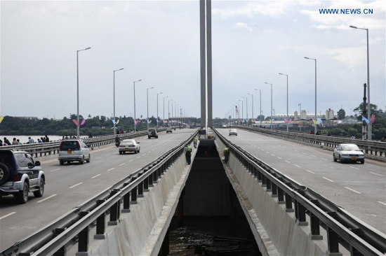 Photo taken on April 18, 2016 shows vehicles traveling on Kigamboni Bridge Dar es Salaam, Tanzania. Tanzania's new 135-million-US-dollar bridge connecting Kigamboni and Kurasini in the east African nation's commercial capital Dar es Salaam, has left an indelible mark to local engineers. (Photo: Xinhua/Pan Siwei) Photo taken on April 18, 2016 shows vehicles traveling on Kigamboni Bridge Dar es Salaam, Tanzania. Tanzania's new 135-million-US-dollar bridge connecting Kigamboni and Kurasini in the east African nation's commercial capital Dar es Salaam, has left an indelible mark to local engineers. (Photo: Xinhua/Pan Siwei)
