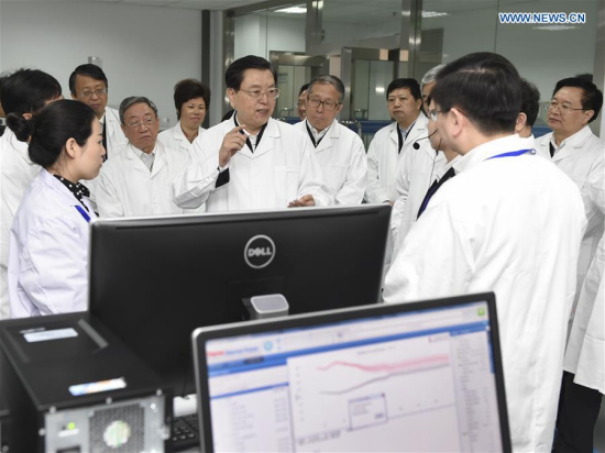 Zhang Dejiang (C), chairman of the Standing Committee of China's National People's Congress, visits Hubei Institute for Food and Drug Control to learn about food inspection issues related with food additives, pesticide residue and microorganism in central China's Hubei Province, April 19, 2016. Zhang had an inspection tour to check on the implementation of food safety law in Hubei from April 17 to April 20. (Photo: Xinhua/Xie Huanchi) Zhang Dejiang (C), chairman of the Standing Committee of China's National People's Congress, visits Hubei Institute for Food and Drug Control to learn about food inspection issues related with food additives, pesticide residue and microorganism in central China's Hubei Province, April 19, 2016. Zhang had an inspection tour to check on the implementation of food safety law in Hubei from April 17 to April 20. (Photo: Xinhua/Xie Huanchi)