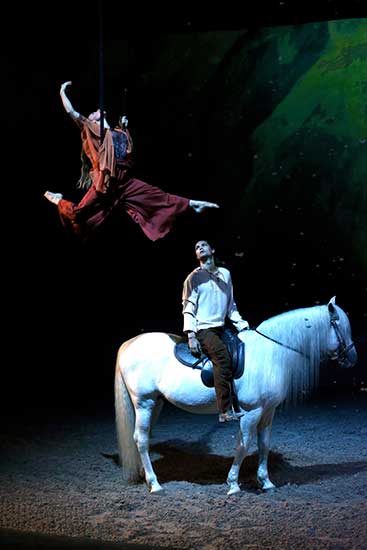 Cavalia is a multimedia spectacle which combines equestrian arts, dramatic visual effects, live music, dance and acrobatics. (Photo by Jiang Dong/China Daily) Cavalia is a multimedia spectacle which combines equestrian arts, dramatic visual effects, live music, dance and acrobatics. (Photo by Jiang Dong/China Daily)