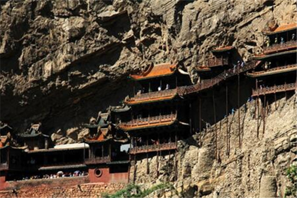Built on a sheer precipice of Mount Heng, the Hanging Temple has again been unveiled after six months shrouded by scaffolding. Built on a sheer precipice of Mount Heng, the Hanging Temple has again been unveiled after six months shrouded by scaffolding.