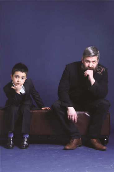 Patrick Kuehnel and his son pose for a family portrait. The German scholar has kept close ties with China, particularly after he married a Chinese woman and started a family about a decade ago. Photos provided to China Daily Patrick Kuehnel and his son pose for a family portrait. The German scholar has kept close ties with China, particularly after he married a Chinese woman and started a family about a decade ago. Photos provided to China Daily