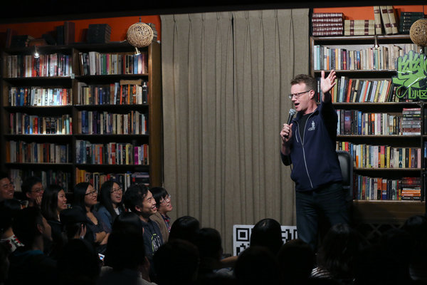 Rowswell often performs stand-up comedy shows at Beijing's Bookworm bookstore. (Photo by Jiang Dong/China Daily) Rowswell often performs stand-up comedy shows at Beijing's Bookworm bookstore. (Photo by Jiang Dong/China Daily)