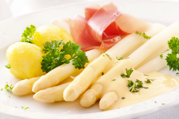 poached white asparagus and egg, Prosciutto, crushed potatoes and creamy hollandaise sauce poached white asparagus and egg, Prosciutto, crushed potatoes and creamy hollandaise sauce