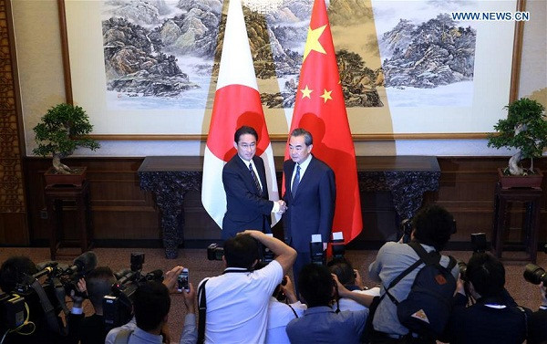 Chinese Foreign Minister Wang Yi (R) holds talks with Japanese Foreign Minister Fumio Kishida in Beijing, capital of China, April 30, 2016. (Xinhua/Yao Dawei) Chinese Foreign Minister Wang Yi (R) holds talks with Japanese Foreign Minister Fumio Kishida in Beijing, capital of China, April 30, 2016. (Xinhua/Yao Dawei)