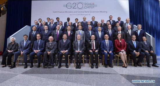 Finance ministers and central bankers of the G20 pose for a family photo after G20 meeting during the IMF and World Bank spring meetings in Washington D.C., capital of the United States, April 15, 2016.(Xinhua file photo/Yin Bogu) Finance ministers and central bankers of the G20 pose for a family photo after G20 meeting during the IMF and World Bank spring meetings in Washington D.C., capital of the United States, April 15, 2016.(Xinhua file photo/Yin Bogu)