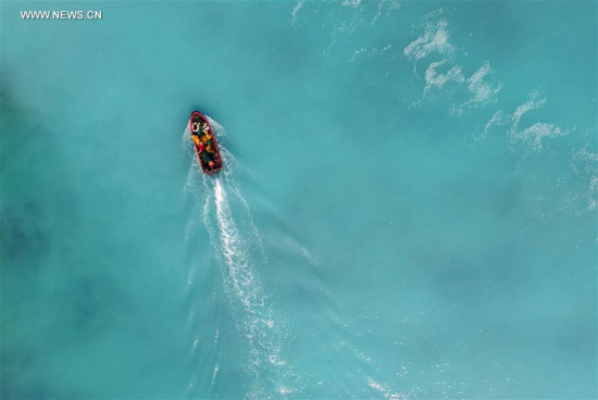 A boat moves on the sea near Zhaoshu Island of Qilianyu Islands in Sansha City, south China's Hainan Province, April 30, 2016. Since Sansha was officially established in 2012, people's lives on Zhaoshu Island have significantly improved by building the power station, seawater desalination plant and the road running around the island. (Xinhua/Yang Guanyu) A boat moves on the sea near Zhaoshu Island of Qilianyu Islands in Sansha City, south China's Hainan Province, April 30, 2016. Since Sansha was officially established in 2012, people's lives on Zhaoshu Island have significantly improved by building the power station, seawater desalination plant and the road running around the island. (Xinhua/Yang Guanyu)