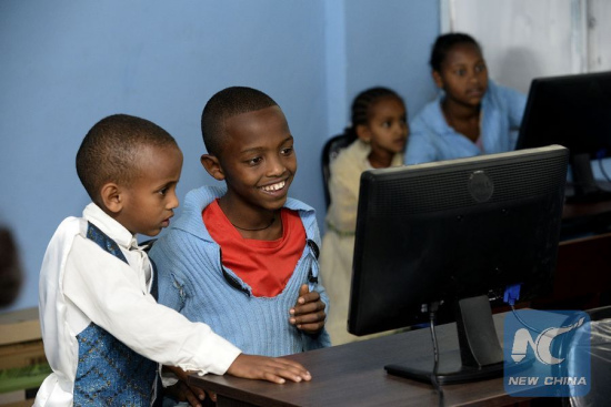 Students use a computer during a donation ceremony at Hayelom Araya Primary School in Addis Ababa, capital of Ethiopia, Jan. 6, 2016. (Photo: Xinhua/Michael Tewelde) Students use a computer during a donation ceremony at Hayelom Araya Primary School in Addis Ababa, capital of Ethiopia, Jan. 6, 2016. (Photo: Xinhua/Michael Tewelde)