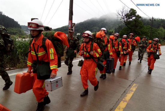 Rescuers search for signs of life at the landslide site in Taining County, southeast China's Fujian Province, May 8, 2016. (Photo: Xinhua/Xiang Jiangmin) Rescuers search for signs of life at the landslide site in Taining County, southeast China's Fujian Province, May 8, 2016. (Photo: Xinhua/Xiang Jiangmin)
