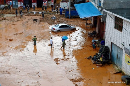 Photo taken on May 9, 2016 shows the flood-hit Xiaqian Village in Xiaohu Township of Jianyang District in Nanping City, southeast China's Fujian Province. (Photo: Xinhua/Jiang Kehong) Photo taken on May 9, 2016 shows the flood-hit Xiaqian Village in Xiaohu Township of Jianyang District in Nanping City, southeast China's Fujian Province. (Photo: Xinhua/Jiang Kehong)