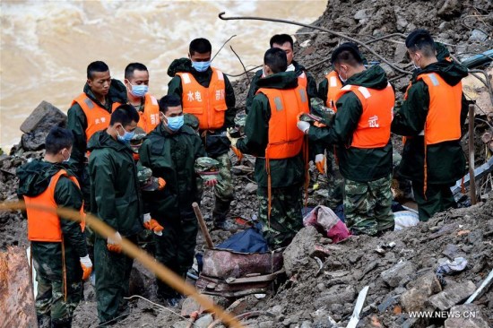 Rescuers pay tribute to the victims at the landslide site in Taining County, southeast China's Fujian Province, May 9, 2016. (Photo: Xinhua/Zhang Guojun) Rescuers pay tribute to the victims at the landslide site in Taining County, southeast China's Fujian Province, May 9, 2016. (Photo: Xinhua/Zhang Guojun)