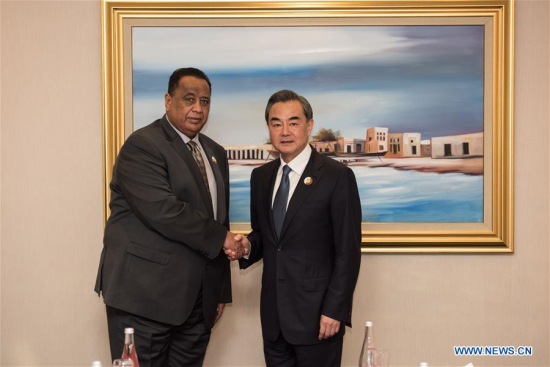 Chinese Foreign Minister Wang Yi(R) meets with Sudan's Foreign Minister Ibrahim Ghandour after the 7th ministerial conference of the China-Arab States Cooperation Forum in Doha, Qatar on May 12, 2016. (Photo: Xinhua/Meng Tao) Chinese Foreign Minister Wang Yi(R) meets with Sudan's Foreign Minister Ibrahim Ghandour after the 7th ministerial conference of the China-Arab States Cooperation Forum in Doha, Qatar on May 12, 2016. (Photo: Xinhua/Meng Tao)