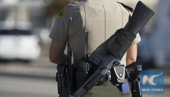 A policeman patrols near the scene of a shooting in San Bernardino City of Southern California, the United States, on Dec. 2, 2015. (Photo: Xinhua/Yang Lei) A policeman patrols near the scene of a shooting in San Bernardino City of Southern California, the United States, on Dec. 2, 2015. (Photo: Xinhua/Yang Lei)