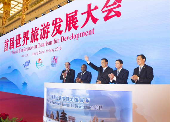 Chinese Premier Li Keqiang (C) attends the opening ceremony of the First World Conference on Tourism for Development in Beijing, capital of China, May 19, 2016. (Photo: Xinhua/Xie Huanchi) Chinese Premier Li Keqiang (C) attends the opening ceremony of the First World Conference on Tourism for Development in Beijing, capital of China, May 19, 2016. (Photo: Xinhua/Xie Huanchi)