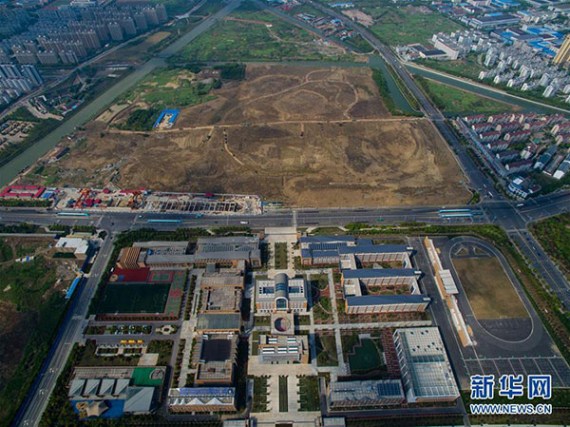 An aerial view of the Changzhou Foreign Languages School in East China's Jiangsu province. The school is located 100 meters from reportedly polluted former site of three chemical plants across the road. (Photo/Xinhua) An aerial view of the Changzhou Foreign Languages School in East China's Jiangsu province. The school is located 100 meters from reportedly polluted former site of three chemical plants across the road. (Photo/Xinhua)