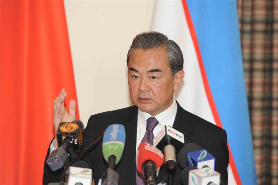 Chinese Foreign Minister Wang Yi addresses reporters after attending a meeting of the Shanghai Cooperation Organization (SCO) foreign ministers in the capital of Uzbekistan on May 24, 2016. (Photo: Xinhua/Sadat) Chinese Foreign Minister Wang Yi addresses reporters after attending a meeting of the Shanghai Cooperation Organization (SCO) foreign ministers in the capital of Uzbekistan on May 24, 2016. (Photo: Xinhua/Sadat)