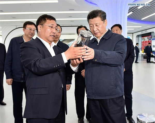 Chinese President Xi Jinping views high-tech products during his visit to the scientific and technological innovation building of Harbin, northeast China's Heilongjiang Province, May 25, 2016. Xi Jinping made an inspection tour in Heilongjiang from May 23 to 25. (Photo:Xinhua/Li Tao) Chinese President Xi Jinping views high-tech products during his visit to the scientific and technological innovation building of Harbin, northeast China's Heilongjiang Province, May 25, 2016. Xi Jinping made an inspection tour in Heilongjiang from May 23 to 25. (Photo:Xinhua/Li Tao)