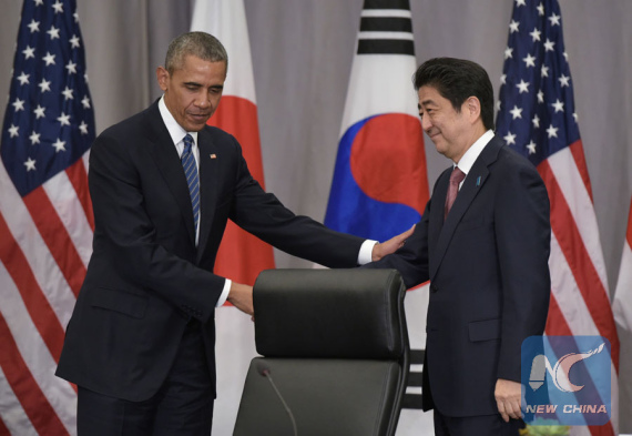 U.S. President Barack Obama (L) shakes hands with Japanese Prime Minister Shinzo Abe following a trilateral meeting with South Korean President Park Geun-hye on the sidelines of the Nuclear Security Summit at the Walter E. Washington Convention Center in Washington D.C., the United States, March 31, 2016. (Photo/Xinhua) U.S. President Barack Obama (L) shakes hands with Japanese Prime Minister Shinzo Abe following a trilateral meeting with South Korean President Park Geun-hye on the sidelines of the Nuclear Security Summit at the Walter E. Washington Convention Center in Washington D.C., the United States, March 31, 2016. (Photo/Xinhua)