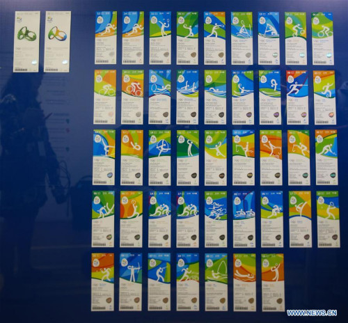 Photo taken on May 20, 2016 shows the visual look of the tickets of the Rio 2016 Olympic Games in Rio de Janeiro, Brazil, on May 20, 2016. The Organizing Committee for the Olympic Games 2016 in Rio de Janeiro unveiled the designs of the tickets on Friday. (Xinhua/Li Ming) Photo taken on May 20, 2016 shows the visual look of the tickets of the Rio 2016 Olympic Games in Rio de Janeiro, Brazil, on May 20, 2016. The Organizing Committee for the Olympic Games 2016 in Rio de Janeiro unveiled the designs of the tickets on Friday. (Xinhua/Li Ming)