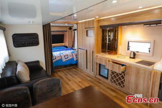 A scrapped bus has been transformed into a room at a scenic spot in Taiyuan City, the capital of North China’s Shanxi Province, May 29, 2016. One air-conditioned room, equipped with a kitchen, TV, and bathroom with toilet, costs less than 200 yuan ($31) a day and mainly attracts young lovers. (Photo/CFP) A scrapped bus has been transformed into a room at a scenic spot in Taiyuan City, the capital of North China’s Shanxi Province, May 29, 2016. One air-conditioned room, equipped with a kitchen, TV, and bathroom with toilet, costs less than 200 yuan ($31) a day and mainly attracts young lovers. (Photo/CFP)