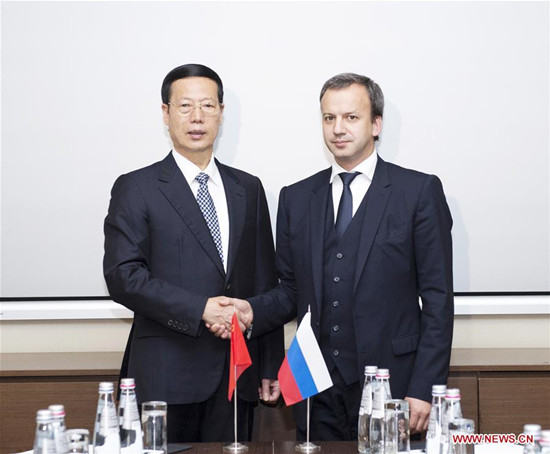 Chinese Vice Premier Zhang Gaoli (L) and his Russian counterpart Arkady Dvorkovich shake hands during the 13th meeting of the China-Russia Energy Cooperation Committee in Russia's Black Sea resort of Sochi, May 30, 2016. (Xinhua/Wang Ye) Chinese Vice Premier Zhang Gaoli (L) and his Russian counterpart Arkady Dvorkovich shake hands during the 13th meeting of the China-Russia Energy Cooperation Committee in Russia's Black Sea resort of Sochi, May 30, 2016. (Xinhua/Wang Ye)