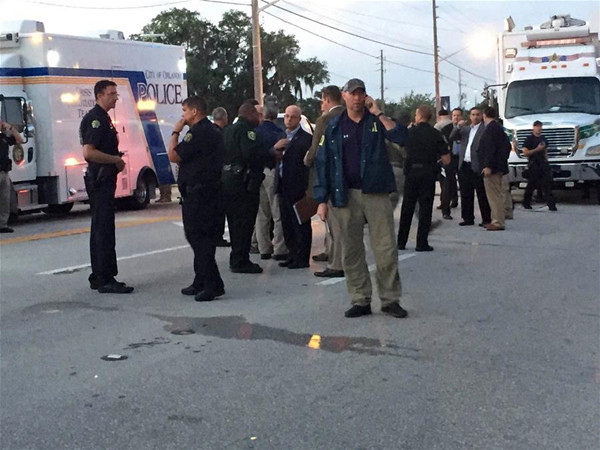 Photo provided by Orlando Police Department shows police officers at the site of the shooting incident in Orlando, Florida, the United States, June 12, 2016. (Xinhua/Orlando Police Department) Photo provided by Orlando Police Department shows police officers at the site of the shooting incident in Orlando, Florida, the United States, June 12, 2016. (Xinhua/Orlando Police Department)