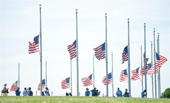 The U.S. national flag flies at half-mast at the Washington Monument to mourn the victims of the mass shooting at a nightclub in Orlando, in Washington D.C., the United States, June 13, 2016. (Photo: Xinhua/Bao Dandan) The U.S. national flag flies at half-mast at the Washington Monument to mourn the victims of the mass shooting at a nightclub in Orlando, in Washington D.C., the United States, June 13, 2016. (Photo: Xinhua/Bao Dandan)