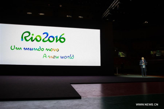 President of the International Olympic Committee (IOC) Thomas Bach delivers a speech as the slogan of the Rio 2016 A new world is shown on the screen at the unveiling ceremony held at the Future Arena in the Barra Olympic Park in Rio de Janeiro, Brazil, on June 14, 2016. (Xinhua/Li Ming) President of the International Olympic Committee (IOC) Thomas Bach delivers a speech as the slogan of the Rio 2016 A new world is shown on the screen at the unveiling ceremony held at the Future Arena in the Barra Olympic Park in Rio de Janeiro, Brazil, on June 14, 2016. (Xinhua/Li Ming)